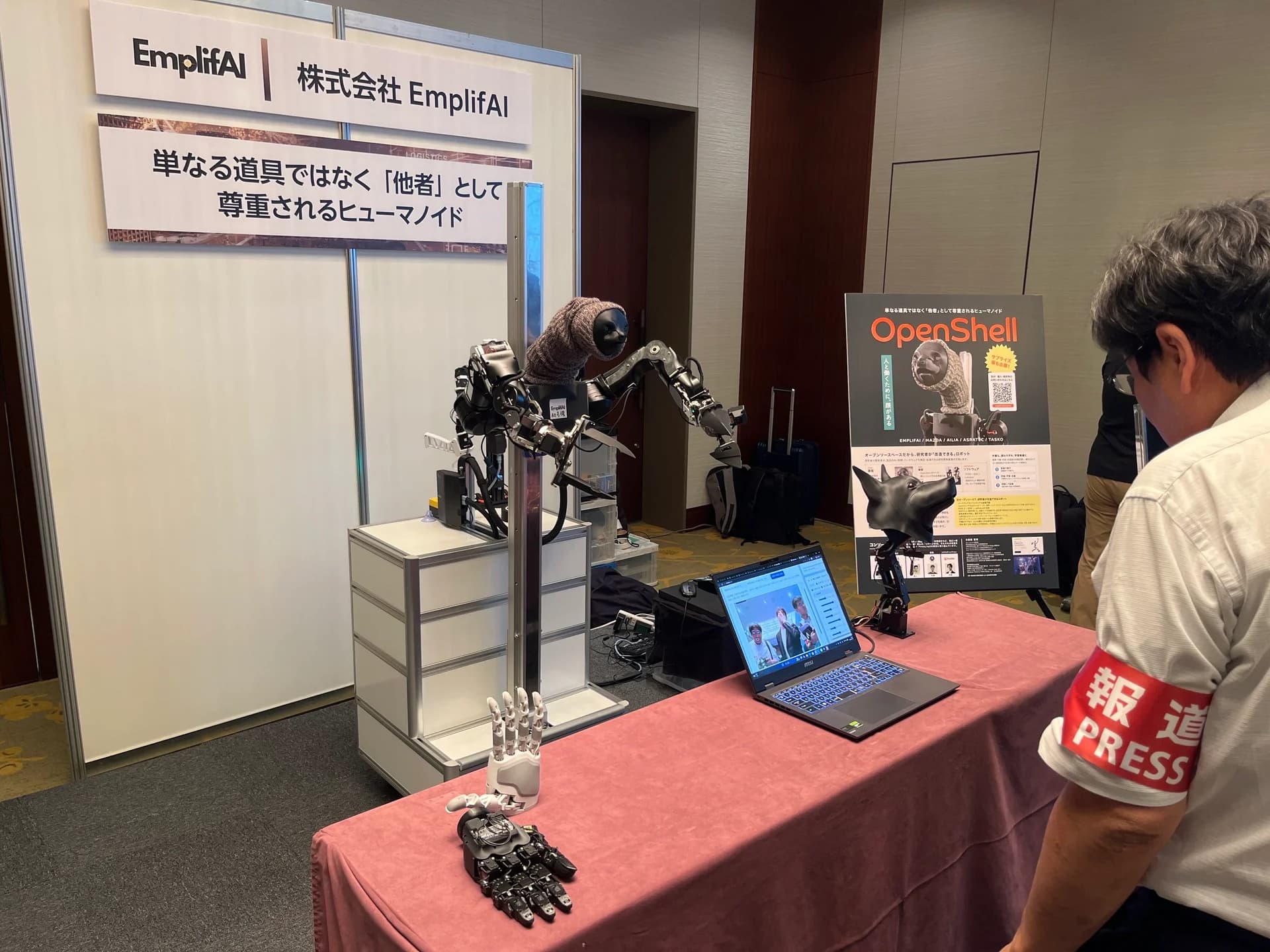 Photos of EmplifAI's OpenShell exhibition booth